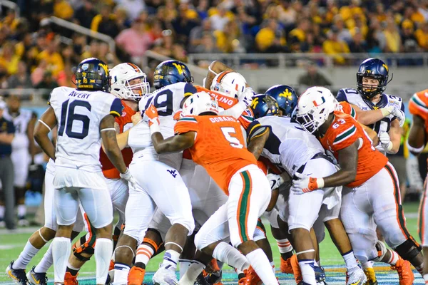 West Virginia Mountaineers Enfrentam Miami Hurricanes Durante 71St Russell Bowl — Fotografia de Stock