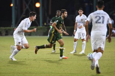 Los Angeles Galaksisi, 14 Temmuz 2020 'de Orlando Florida ABD' deki ESPN Vahşi Spor Dünyası 'nda düzenlenen MLS Sırt Turnuvası sırasında Portland Timbers ile karşı karşıya geldi.