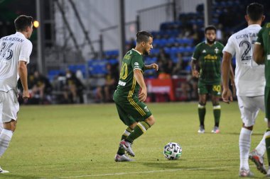 Los Angeles Galaksisi, 14 Temmuz 2020 'de Orlando Florida ABD' deki ESPN Vahşi Spor Dünyası 'nda düzenlenen MLS Sırt Turnuvası sırasında Portland Timbers ile karşı karşıya geldi.