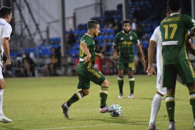Los Angeles Galaksisi, 14 Temmuz 2020 'de Orlando Florida ABD' deki ESPN Vahşi Spor Dünyası 'nda düzenlenen MLS Sırt Turnuvası sırasında Portland Timbers ile karşı karşıya geldi.