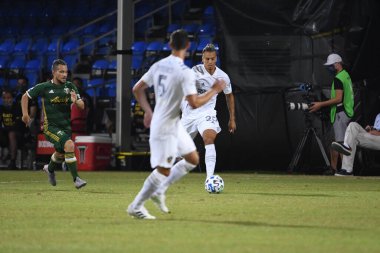 Los Angeles Galaksisi, 14 Temmuz 2020 'de Orlando Florida ABD' deki ESPN Vahşi Spor Dünyası 'nda düzenlenen MLS Sırt Turnuvası sırasında Portland Timbers ile karşı karşıya geldi.