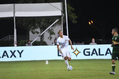 Los Angeles Galaksisi, 14 Temmuz 2020 'de Orlando Florida ABD' deki ESPN Vahşi Spor Dünyası 'nda düzenlenen MLS Sırt Turnuvası sırasında Portland Timbers ile karşı karşıya geldi..