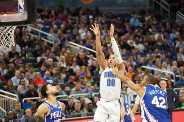 Orlando Magic 27 Aralık 2019 Cuma günü Orlando, Florida 'daki Amway Arena' da Philadelphia 76ers 'a ev sahipliği yapıyor..