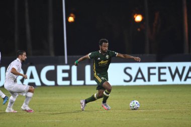 Los Angeles Galaksisi, 14 Temmuz 2020 'de Orlando Florida ABD' deki ESPN Vahşi Spor Dünyası 'nda düzenlenen MLS Sırt Turnuvası sırasında Portland Timbers ile karşı karşıya geldi.