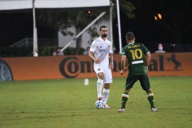 Los Angeles Galaksisi, 14 Temmuz 2020 'de Orlando Florida ABD' deki ESPN Vahşi Spor Dünyası 'nda düzenlenen MLS Sırt Turnuvası sırasında Portland Timbers ile karşı karşıya geldi.