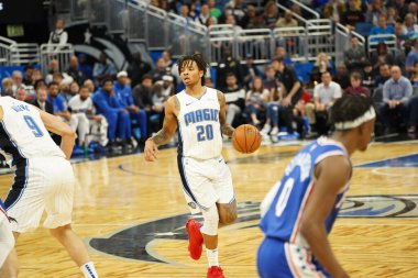 Orlando Magic 27 Aralık 2019 Cuma günü Orlando, Florida 'daki Amway Arena' da Philadelphia 76ers 'a ev sahipliği yapıyor..
