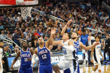 Orlando Magic 27 Aralık 2019 Cuma günü Orlando, Florida 'daki Amway Arena' da Philadelphia 76ers 'a ev sahipliği yapıyor..