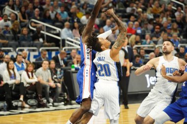 Orlando Magic 27 Aralık 2019 Cuma günü Orlando, Florida 'daki Amway Arena' da Philadelphia 76ers 'a ev sahipliği yapıyor..