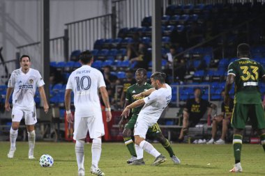Los Angeles Galaksisi, 14 Temmuz 2020 'de Orlando Florida ABD' deki ESPN Vahşi Spor Dünyası 'nda düzenlenen MLS Sırt Turnuvası sırasında Portland Timbers ile karşı karşıya geldi.