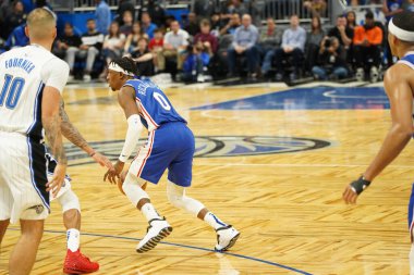 Orlando Magic 27 Aralık 2019 Cuma günü Orlando, Florida 'daki Amway Arena' da Philadelphia 76ers 'a ev sahipliği yapıyor..