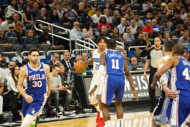 Orlando Magic 27 Aralık 2019 Cuma günü Orlando, Florida 'daki Amway Arena' da Philadelphia 76ers 'a ev sahipliği yapıyor..