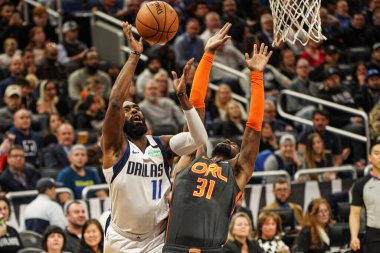 Dallas Mavericks oyuncusu Tim Hardaway Jr. 11 numara, Orlando Florida 'daki Amway Center' da 21 Şubat 2020 tarihinde oynanan maçta turnikeye çıkıyor..  