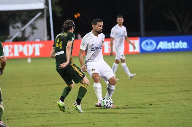 Los Angeles Galaksisi, 14 Temmuz 2020 'de Orlando Florida ABD' deki ESPN Vahşi Spor Dünyası 'nda düzenlenen MLS Sırt Turnuvası sırasında Portland Timbers ile karşı karşıya geldi..