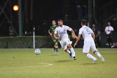 Los Angeles Galaksisi, 14 Temmuz 2020 'de Orlando Florida ABD' deki ESPN Vahşi Spor Dünyası 'nda düzenlenen MLS Sırt Turnuvası sırasında Portland Timbers ile karşı karşıya geldi.