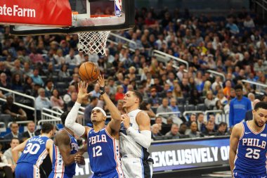 Orlando Magic 27 Aralık 2019 Cuma günü Orlando, Florida 'daki Amway Arena' da Philadelphia 76ers 'a ev sahipliği yapıyor..