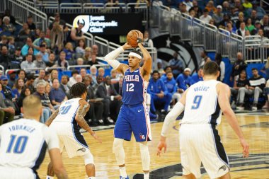 Orlando Magic 27 Aralık 2019 Cuma günü Orlando, Florida 'daki Amway Arena' da Philadelphia 76ers 'a ev sahipliği yapıyor..