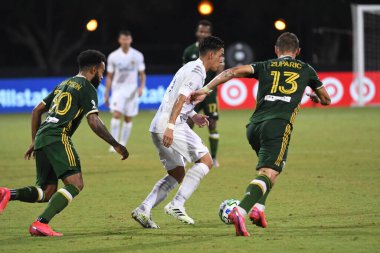 Los Angeles Galaksisi, 14 Temmuz 2020 'de Orlando Florida ABD' deki ESPN Vahşi Spor Dünyası 'nda düzenlenen MLS Sırt Turnuvası sırasında Portland Timbers ile karşı karşıya geldi.