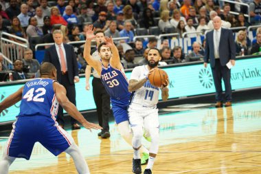 Orlando Magic 27 Aralık 2019 Cuma günü Orlando, Florida 'daki Amway Arena' da Philadelphia 76ers 'a ev sahipliği yapıyor..