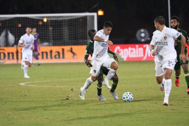Los Angeles Galaksisi, 14 Temmuz 2020 'de Orlando Florida ABD' deki ESPN Vahşi Spor Dünyası 'nda düzenlenen MLS Sırt Turnuvası sırasında Portland Timbers ile karşı karşıya geldi..