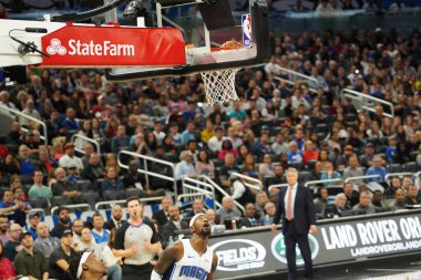 Orlando Magic 27 Aralık 2019 Cuma günü Orlando, Florida 'daki Amway Arena' da Philadelphia 76ers 'a ev sahipliği yapıyor..