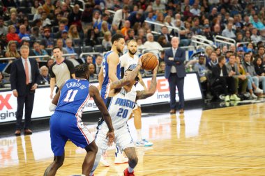 Orlando Magic 27 Aralık 2019 Cuma günü Orlando, Florida 'daki Amway Arena' da Philadelphia 76ers 'a ev sahipliği yapıyor..