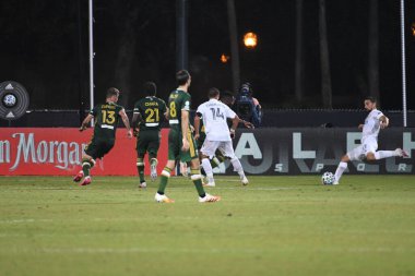 Los Angeles Galaksisi, 14 Temmuz 2020 'de Orlando Florida ABD' deki ESPN Vahşi Spor Dünyası 'nda düzenlenen MLS Sırt Turnuvası sırasında Portland Timbers ile karşı karşıya geldi.
