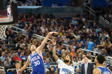 Orlando Magic 27 Aralık 2019 Cuma günü Orlando, Florida 'daki Amway Arena' da Philadelphia 76ers 'a ev sahipliği yapıyor..