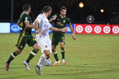 Los Angeles Galaksisi, 14 Temmuz 2020 'de Orlando Florida ABD' deki ESPN Vahşi Spor Dünyası 'nda düzenlenen MLS Sırt Turnuvası sırasında Portland Timbers ile karşı karşıya geldi.