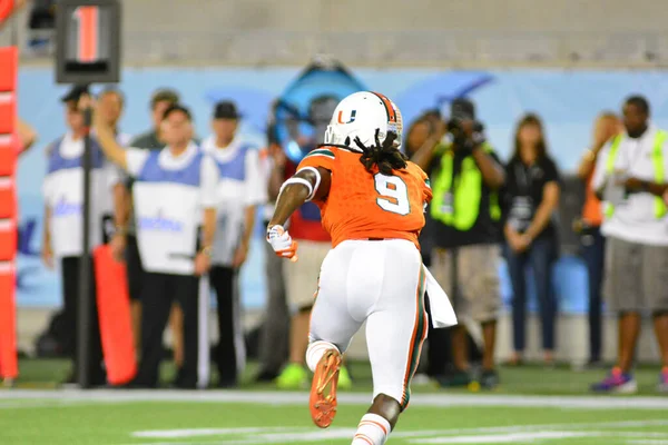 West Virginia Mountaineers Enfrentam Miami Hurricanes Durante 71St Russell Bowl — Fotografia de Stock