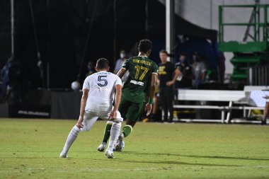 Los Angeles Galaksisi, 14 Temmuz 2020 'de Orlando Florida ABD' deki ESPN Vahşi Spor Dünyası 'nda düzenlenen MLS Sırt Turnuvası sırasında Portland Timbers ile karşı karşıya geldi.