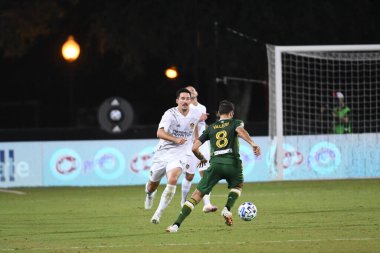 Los Angeles Galaksisi, 14 Temmuz 2020 'de Orlando Florida ABD' deki ESPN Vahşi Spor Dünyası 'nda düzenlenen MLS Sırt Turnuvası sırasında Portland Timbers ile karşı karşıya geldi.