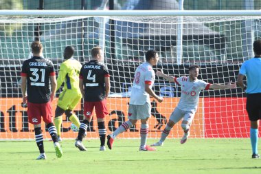 Toronto FC oyuncusu Piatti ve Pablo # 7, 13 Temmuz 2020 tarihinde Orlando Florida ESPN Vahşi Spor Dünyası 'nda düzenlenen MLS is Back Turnuvası' nda golü kutladı..  