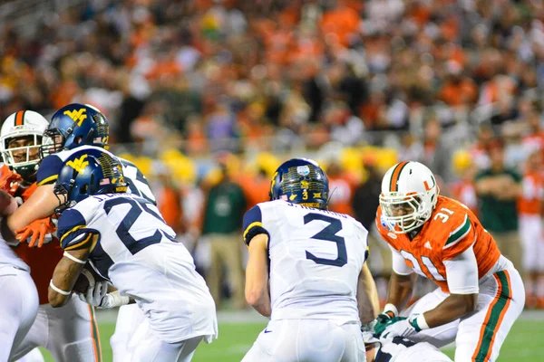 West Virginia Mountaineers Enfrentam Miami Hurricanes Durante 71St Russell Bowl — Fotografia de Stock