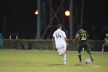 Los Angeles Galaksisi, 14 Temmuz 2020 'de Orlando Florida ABD' deki ESPN Vahşi Spor Dünyası 'nda düzenlenen MLS Sırt Turnuvası sırasında Portland Timbers ile karşı karşıya geldi.