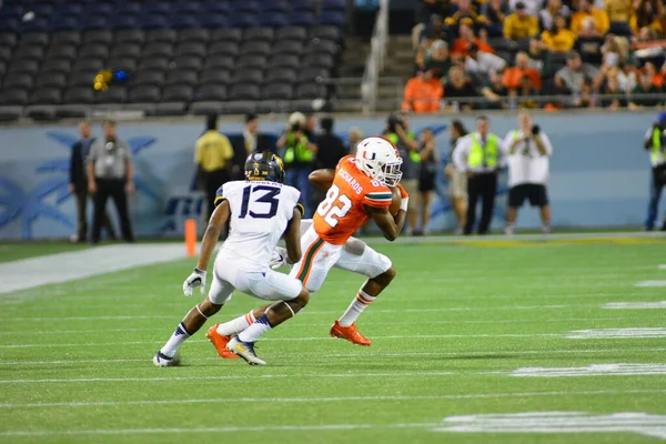 West Virginia Mountaineers Enfrentam Miami Hurricanes Durante 71St Russell Bowl — Fotografia de Stock