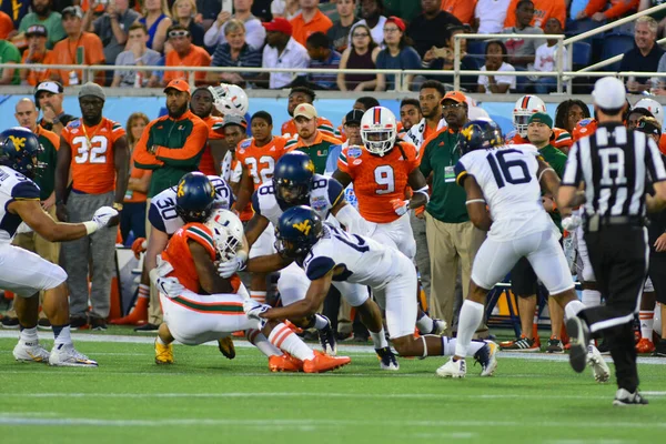 West Virginia Mountaineers Enfrentam Miami Hurricanes Durante 71St Russell Bowl — Fotografia de Stock