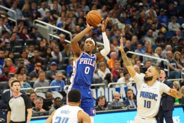 Orlando Magic 27 Aralık 2019 Cuma günü Orlando, Florida 'daki Amway Arena' da Philadelphia 76ers 'a ev sahipliği yapıyor..
