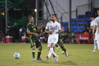 Los Angeles Galaksisi, 14 Temmuz 2020 'de Orlando Florida ABD' deki ESPN Vahşi Spor Dünyası 'nda düzenlenen MLS Sırt Turnuvası sırasında Portland Timbers ile karşı karşıya geldi.
