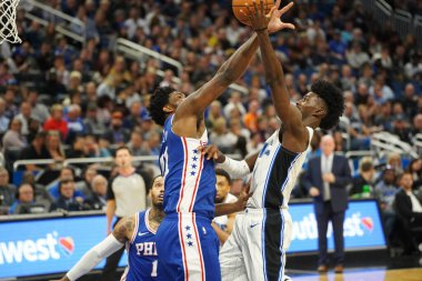 Orlando Magic 27 Aralık 2019 Cuma günü Orlando, Florida 'daki Amway Arena' da Philadelphia 76ers 'a ev sahipliği yapıyor..
