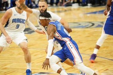 Orlando Magic 27 Aralık 2019 Cuma günü Orlando, Florida 'daki Amway Arena' da Philadelphia 76ers 'a ev sahipliği yapıyor..