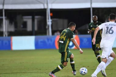 Los Angeles Galaksisi, 14 Temmuz 2020 'de Orlando Florida ABD' deki ESPN Vahşi Spor Dünyası 'nda düzenlenen MLS Sırt Turnuvası sırasında Portland Timbers ile karşı karşıya geldi.