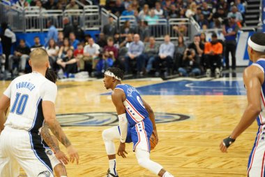 Orlando Magic 27 Aralık 2019 Cuma günü Orlando, Florida 'daki Amway Arena' da Philadelphia 76ers 'a ev sahipliği yapıyor..