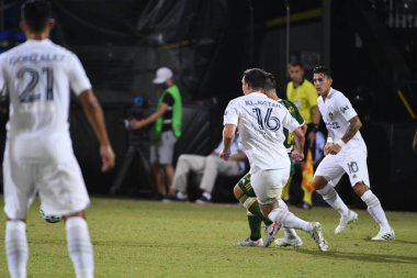 Los Angeles Galaksisi, 14 Temmuz 2020 'de Orlando Florida ABD' deki ESPN Vahşi Spor Dünyası 'nda düzenlenen MLS Sırt Turnuvası sırasında Portland Timbers ile karşı karşıya geldi.