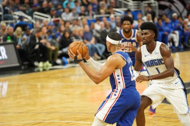 Orlando Magic 27 Aralık 2019 Cuma günü Orlando, Florida 'daki Amway Arena' da Philadelphia 76ers 'a ev sahipliği yapıyor..