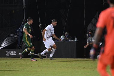 Los Angeles Galaksisi, 14 Temmuz 2020 'de Orlando Florida ABD' deki ESPN Vahşi Spor Dünyası 'nda düzenlenen MLS Sırt Turnuvası sırasında Portland Timbers ile karşı karşıya geldi..