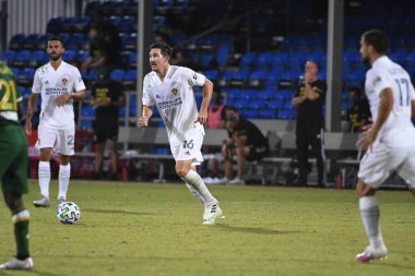 Los Angeles Galaksisi, 14 Temmuz 2020 'de Orlando Florida ABD' deki ESPN Vahşi Spor Dünyası 'nda düzenlenen MLS Sırt Turnuvası sırasında Portland Timbers ile karşı karşıya geldi..