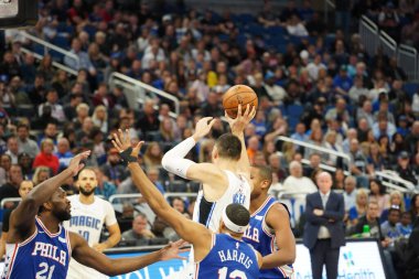 Orlando Magic 27 Aralık 2019 Cuma günü Orlando, Florida 'daki Amway Arena' da Philadelphia 76ers 'a ev sahipliği yapıyor..
