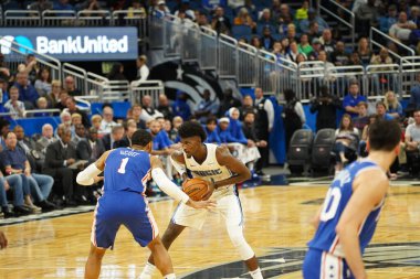 Orlando Magic 27 Aralık 2019 Cuma günü Orlando, Florida 'daki Amway Arena' da Philadelphia 76ers 'a ev sahipliği yapıyor..