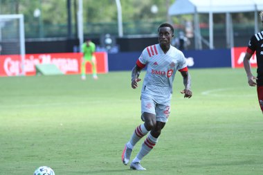 Toronto FC, 13 Temmuz 2020 tarihinde Orlando Florida 'daki ESPN Wild World of Sports' ta düzenlenen MLS Back Tournament sırasında D.C. United ile karşılaştı. Fotoğraf: Marty Jean-Louis