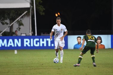 Los Angeles Galaksisi, 14 Temmuz 2020 'de Orlando Florida ABD' deki ESPN Vahşi Spor Dünyası 'nda düzenlenen MLS Sırt Turnuvası sırasında Portland Timbers ile karşı karşıya geldi.